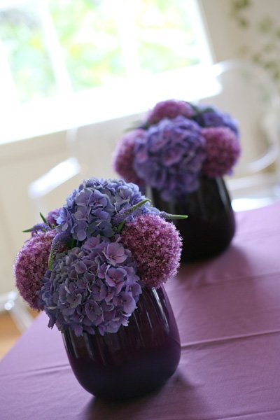 Hydrangea and allium displays in purple tones