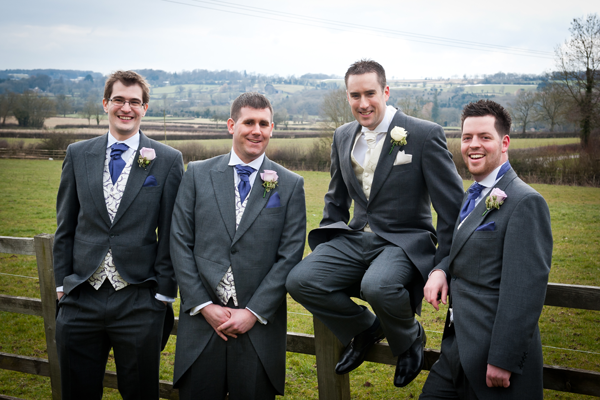 Rose buttonholes for the groom and groomsmen