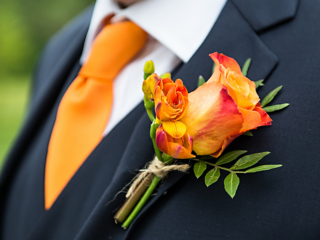 Orange Rose and Freesia. Floral design by Cotswold Blooms, wedding florist based in Cheltenham.