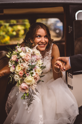 Shower bouquet in light pinks and white with a touch of fern. , Floral design by Cotswold Blooms, wedding florist based in Cheltenham.