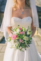 Light pink, white and lime green mixed bouquet including Roses, Veronica and Eustoma.Floral design by Cotswold Blooms, wedding florist based in Cheltenham.