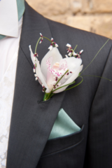 Orchid buttonhole. Floral design by Cotswold Blooms, wedding florist based in Cheltenham.