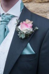 Carmen Rose buttonhole. Floral design by Cotswold Blooms, wedding florist based in Cheltenham.
