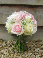 Domed rose and gypsophila bouquet. Floral design by Cotswold Blooms, wedding florist based in Cheltenham.
