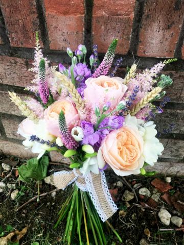 Pastel bouquet including Roses, Stocks, Veronica and Wheat. Floral design by Cotswold Blooms, wedding florist based in Cheltenham.