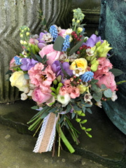 Country garden hand tied bouquet in pastel shades. Floral design by Cotswold Blooms, wedding florist based in Cheltenham.