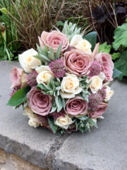 Dusky pink and cream domed hand tied bouquet. Floral design by Cotswold Blooms, wedding florist based in Cheltenham.