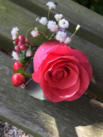 Rose with Hypericum and Gypsophila. Floral design by Cotswold Blooms, wedding florist based in Cheltenham.