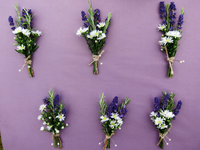 Lavender, Daisy and Rosemary country garden display tied with twine. Floral design by Cotswold Blooms, wedding florist based in Cheltenham.