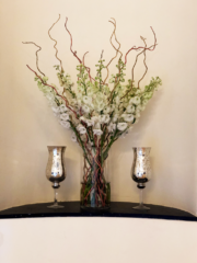 White Delphinium with Hazel display at Pittville Pump Rooms. Floral design by Cotswold Blooms, wedding florist based in Cheltenham.