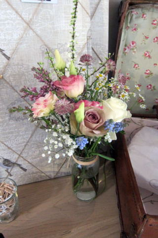 Country garden jar display on the signing table. Floral design by Cotswold Blooms, wedding florist based in Cheltenham.
