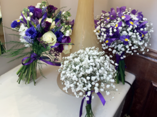 Bride, bridesmaids and flower girl bouquet in purple, white and blue. Floral design by Cotswold Blooms, wedding florist based in Cheltenham.