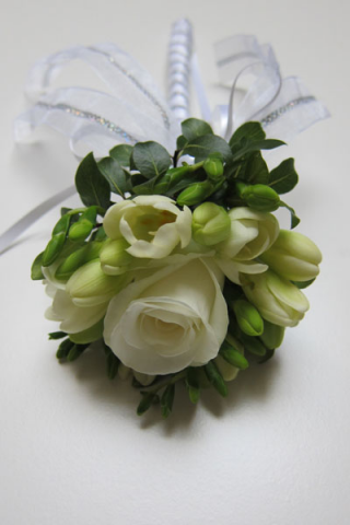 Flower girl display on a wand handle. Floral design by Cotswold Blooms, wedding florist based in Cheltenham.