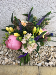 Natural hand tied bouquet including pink Peonies, purple Veronica, yellow Freesia and Stocks. Floral design by Cotswold Blooms, wedding florist based in Cheltenham.