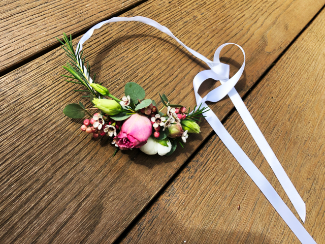 Flower crown with Spray Rose, Waxflower and mixed foliage. Floral design by Cotswold Blooms, wedding florist based in Cheltenham.