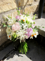 Spring hand tied bouquet including Narcissi, Stocks, Astilbe and Roses. Floral design by Cotswold Blooms, wedding florist based in Cheltenham.