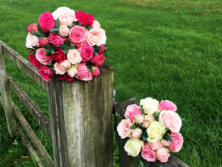 Bride and bridesmaid Rose bouquets in shades of pink. Floral design by Cotswold Blooms, wedding florist based in Cheltenham.