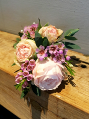 Light pink Spray Rose with Waxflower and foliage. Floral design by Cotswold Blooms, wedding florist based in Cheltenham.