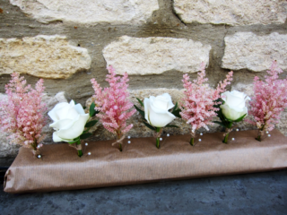 White Rose and Astilbe buttonholes. Floral design by Cotswold Blooms, wedding florist based in Cheltenham.