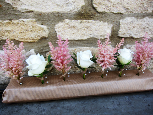 White Rose and Astilbe buttonholes. Floral design by Cotswold Blooms, wedding florist based in Cheltenham.