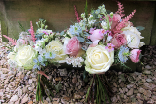 Country garden bouquet with touches of Nigella. Floral design by Cotswold Blooms, wedding florist based in Cheltenham.