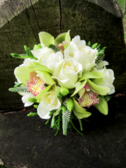 White and lime green bouquet including Orchid, Roses, Veronica and Freesia. Floral design by Cotswold Blooms, wedding florist based in Cheltenham.