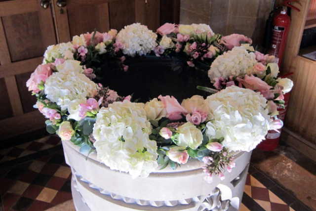 Hydrangea and rose font display. Floral design by Cotswold Blooms, wedding florist based in Cheltenham.