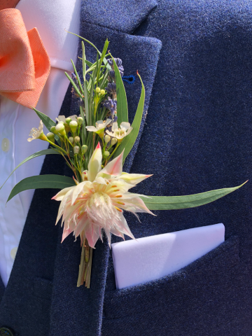 Bridal Protea with Waxflower, Lavender and mixed foliage. Floral design by Cotswold Blooms, wedding florist based in Cheltenham.