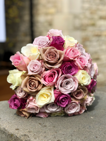 Mixed Rose brides bouquet. Floral design by Cotswold Blooms, wedding florist based in Cheltenham.