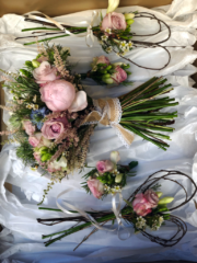 Brides bouquet with flower girl wands and corsages. Floral design by Cotswold Blooms, wedding florist based in Cheltenham.