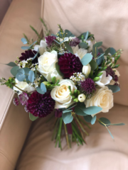 Burgundy and white bouquet with a touch of foliage. Floral design by Cotswold Blooms, wedding florist based in Cheltenham.