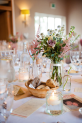 Amnesia roses in wild jar displays at Hyde House. Floral design by Cotswold Blooms, wedding florist based in Cheltenham.