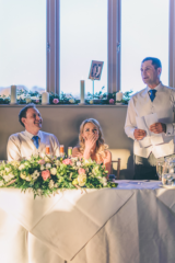 White with lush green long and low top table display. Floral design by Cotswold Blooms, wedding florist based in Cheltenham.