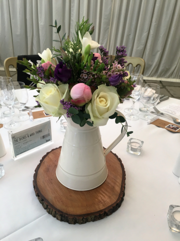 Peonies, Roses and Eustoma jug table centre, at Birtsmorton Court. Floral design by Cotswold Blooms, wedding florist based in Cheltenham.