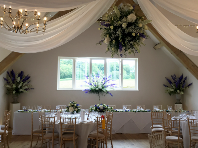 Flower ball and delphinium displays at Hyde House, Stow-on-the-Wold.  Floral design by Cotswold Blooms, wedding florist based in Cheltenham.