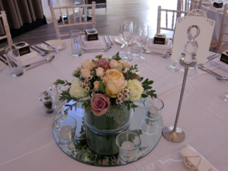 Rose and Wax Flower salad bowl display at Manor by the Lake, Cheltenham. Floral design by Cotswold Blooms, wedding florist based in Cheltenham.