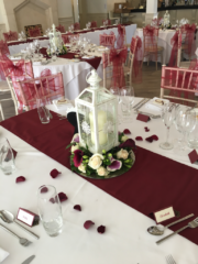 A lantern table display with Calla Lilies and Roses. Floral design by Cotswold Blooms, wedding florist based in Cheltenham.