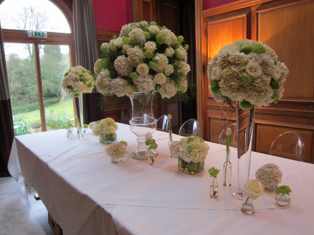 Apples, Hydrangea and Rose table display at Cowley Manor. Floral design by Cotswold Blooms, wedding florist based in Cheltenham.
