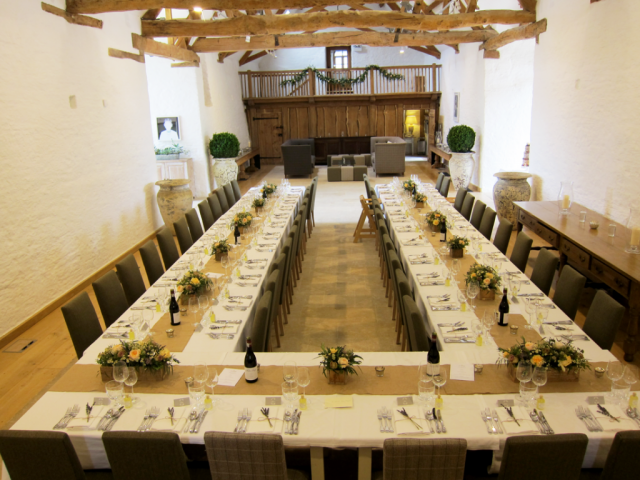 Venue decorated with flowers at Thyme, Southrop.  Floral design by Cotswold Blooms, wedding florist based in Cheltenham.
