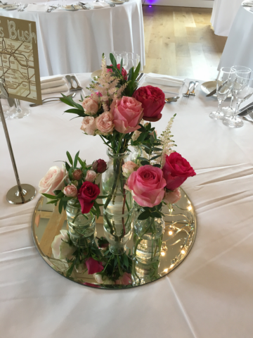 Vintage cut glass display with mixed pink roses and a touch of foliage at Hyde House. Floral design by Cotswold Blooms, wedding florist based in Cheltenham.