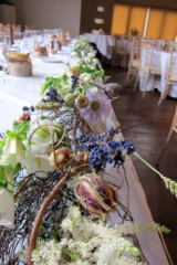 Fresh and dried top table display. Floral design by Cotswold Blooms, wedding florist based in Cheltenham.