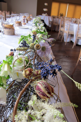Fresh and dried top table display. Floral design by Cotswold Blooms, wedding florist based in Cheltenham.