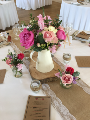 Peonies, Roses and Sweet Pea in this soft elegant table display at Hyde House. Floral design by Cotswold Blooms, wedding florist based in Cheltenham.