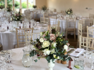 Country garden urn display at Hyde House, Stow-on-the-Wold.