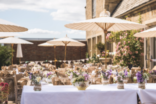 Garland party wedding at Manor by the Lake, Cheltenham. Designed with a mix of English Country Garden flowers. Floral design by Cotswold Blooms, wedding florist based in Cheltenham.