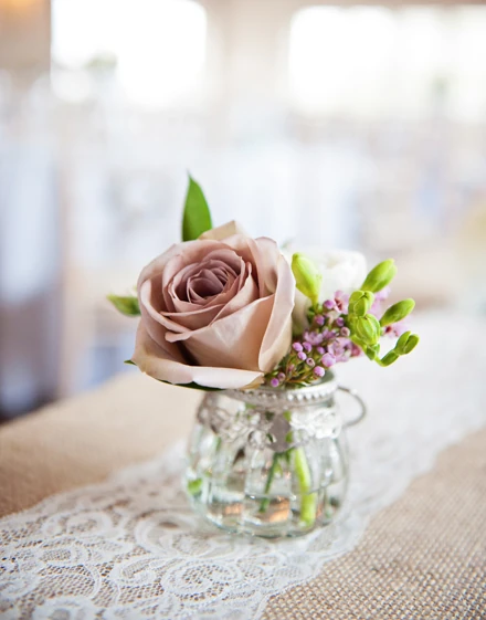 Wedding place setting with floral details and table styling