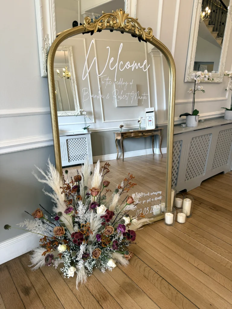 Boho welcome mirror styling with pampas grass and cappuccino roses