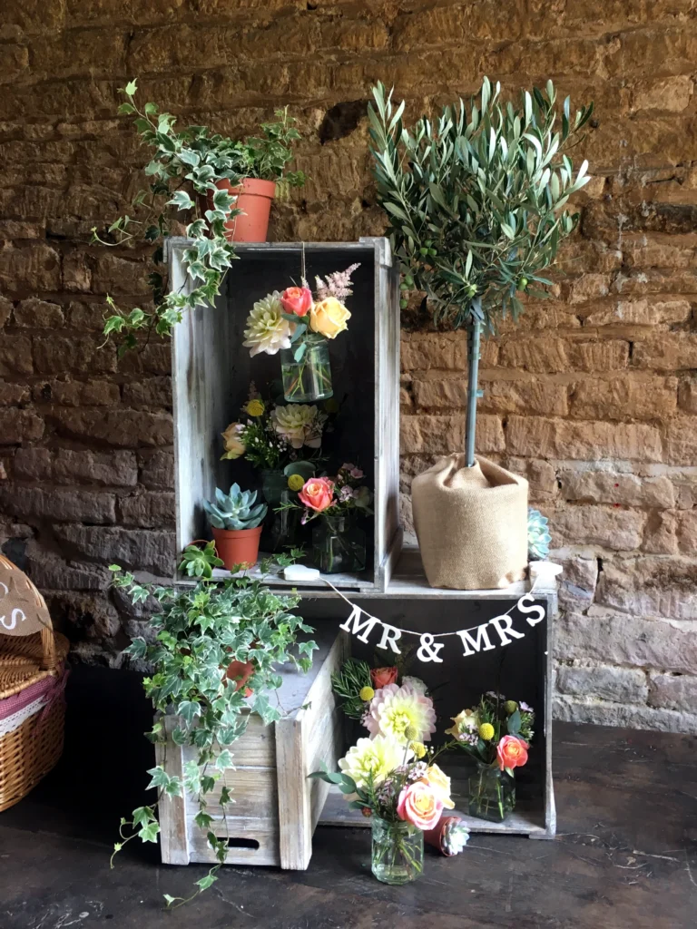 Crate display to welcome wedding guests at Stanway Fountain