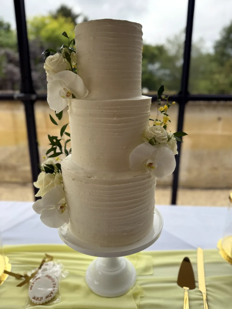 Floral wedding cake with orchid detailing