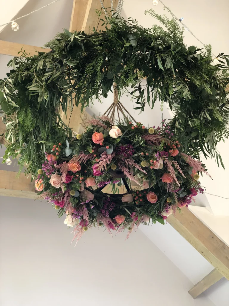 Two-level halo floral display at Hyde House, Stow-on-the-Wold